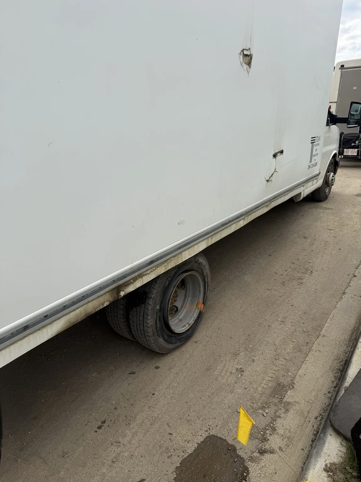 Inner Dually Flat Tire Repair on a Ford E450 Cube Van in South Edmonton