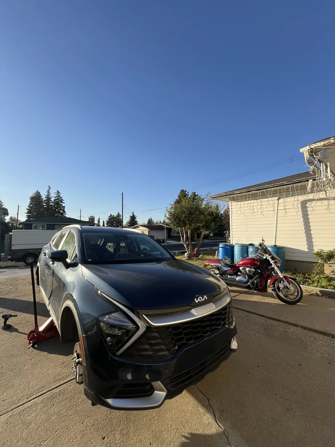 Four tire changeover and wheel balancing for Kia Sportage in Edmonton by Dama Mobile Tire Shop