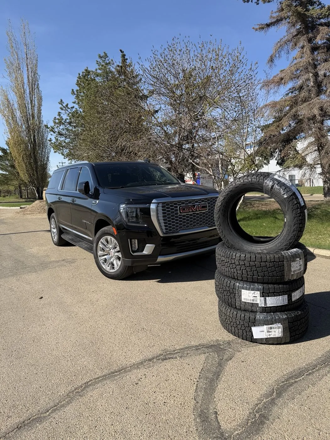 Brand new tires delivered, mounted and installed on-site for GMC Yukon Denali in Edmonton