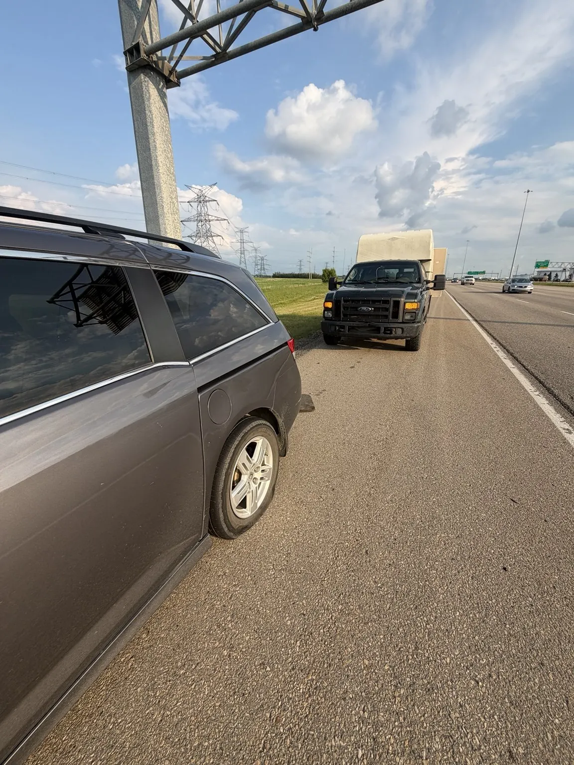 Honda Odyssey Roadside Tire Assistance on Anthony Henday Drive photo