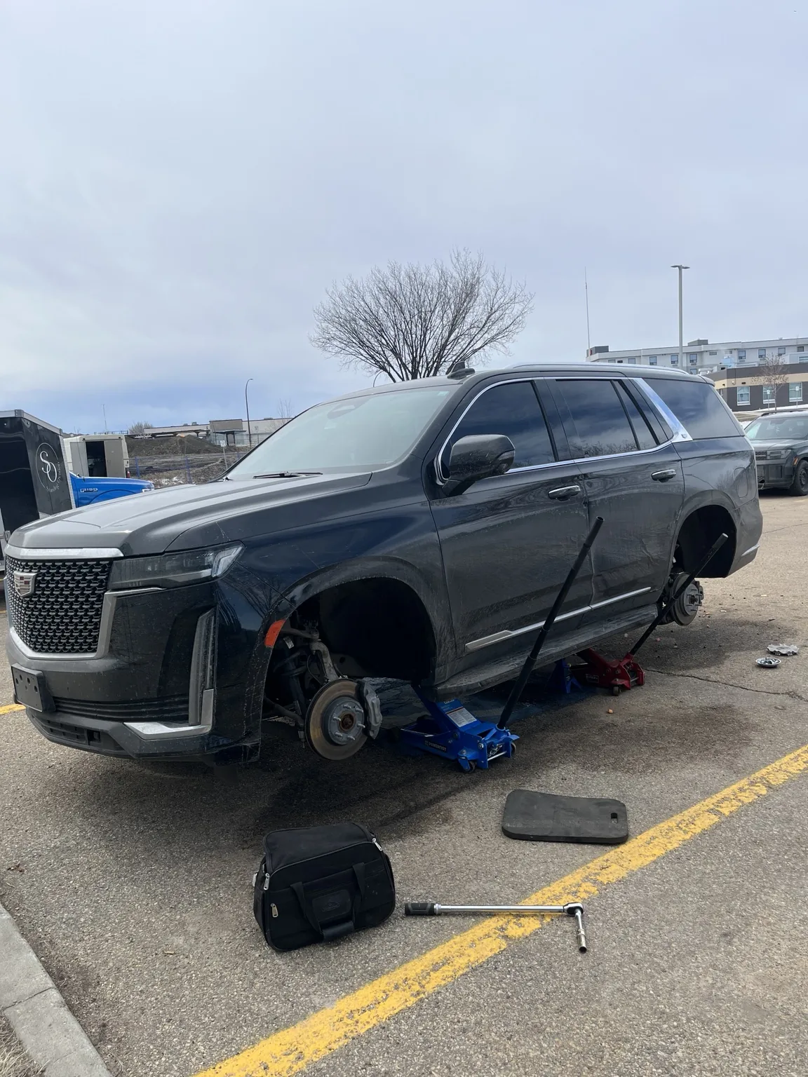 Two tire change to match current vehicle tire tread for Cadillac Escalade in Edmonton by Dama Mobile Tire Shop
